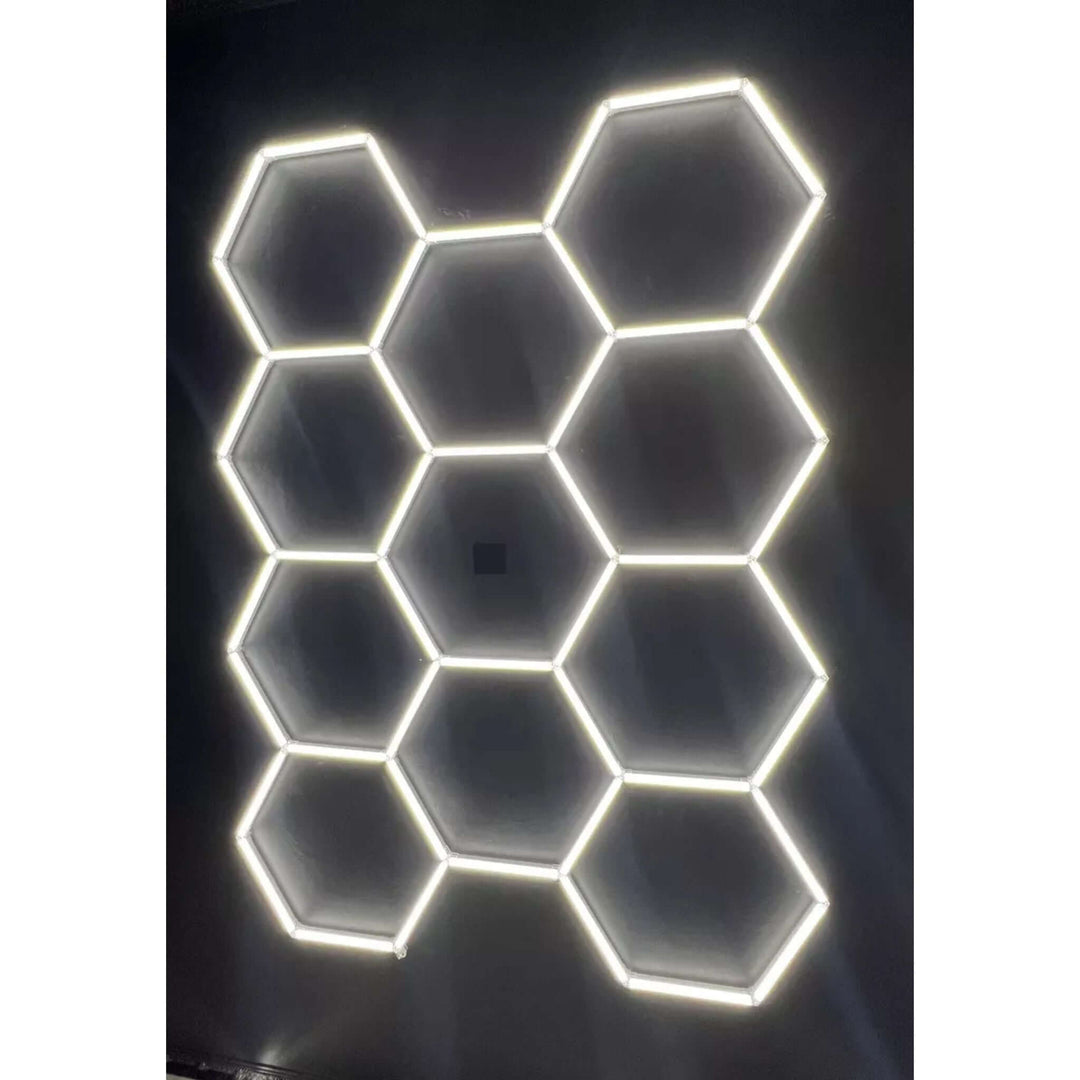 Imagem da COLMEIA 11 CELULAS BIVOLT MODELO POLICARBONATO KERS com iluminação hexagonal.