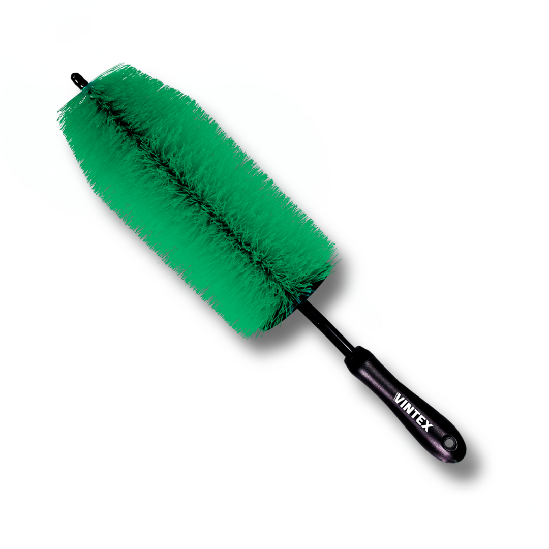 Escova para furo de roda Vintex em verde, ideal para limpeza detalhada de rodas de carro.
