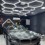Carregar imagem na Galeria, KERS ILUMINACAO COLMEIA 11 CELULAS COLOR BALANCE BIVOLT 330W - 3 CORES em um ambiente automotivo moderno.